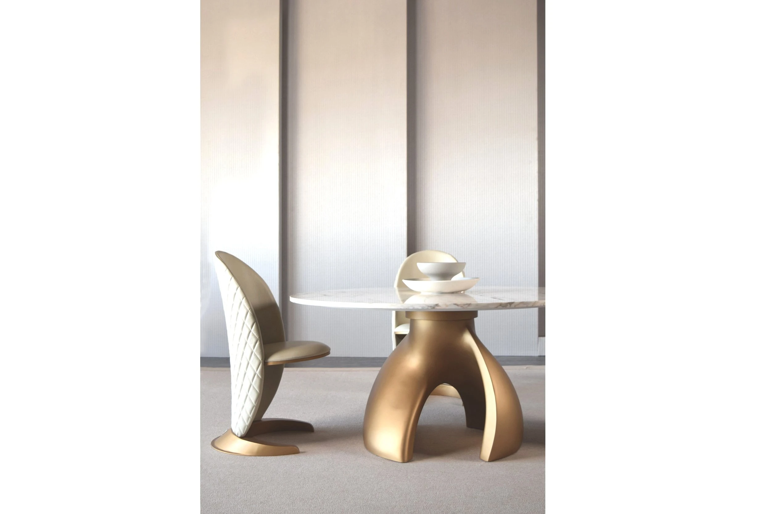 Ambra modern circular dining table and chairs modern display setting