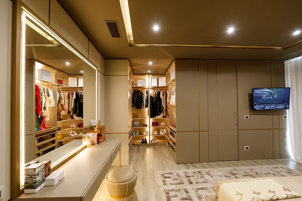 Private Villa South Albania - walk-in wardrobe with a central island and wall-mounted television, Vlore