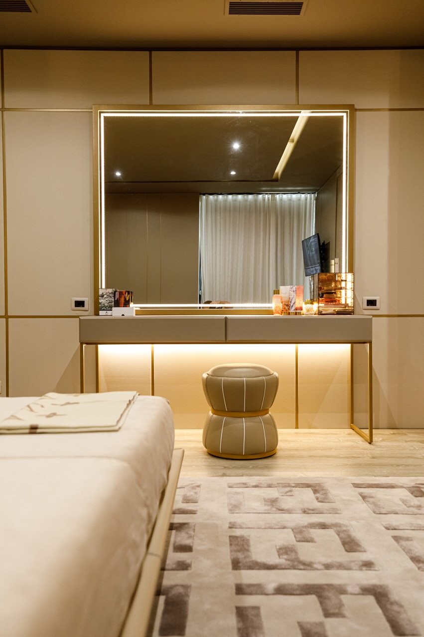 Private Villa South Albania - lit dressing mirror above a vanity with a gold stool, Vlore