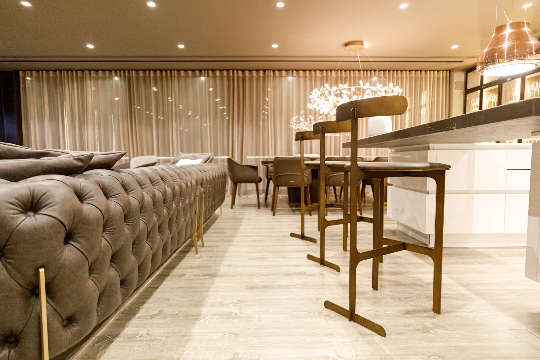 Private Villa South Albania - kitchen bar with stools beside a tufted sofa, Vlore