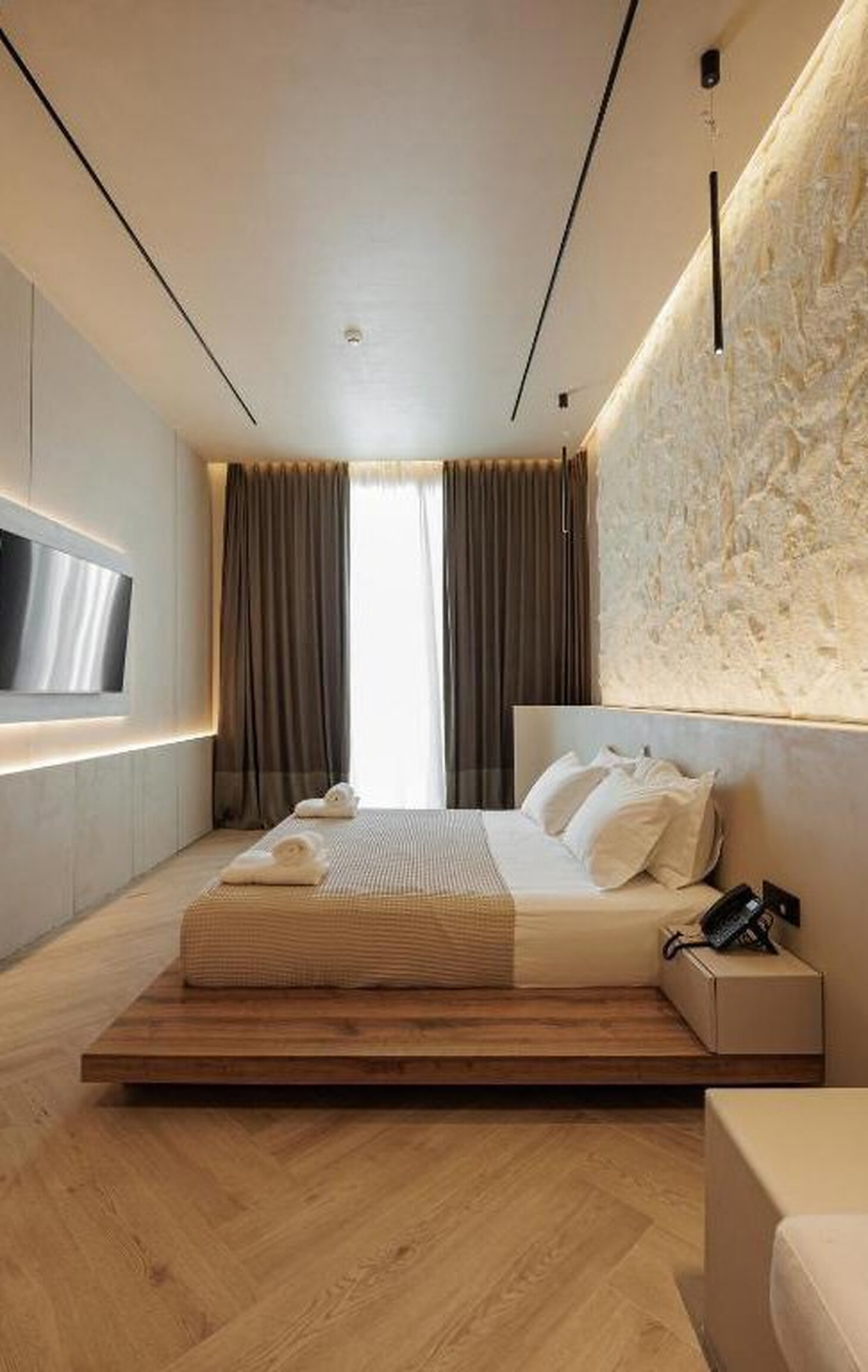 Private Villa South Albania - bedroom with a low bed facing a curtained window, Vlore