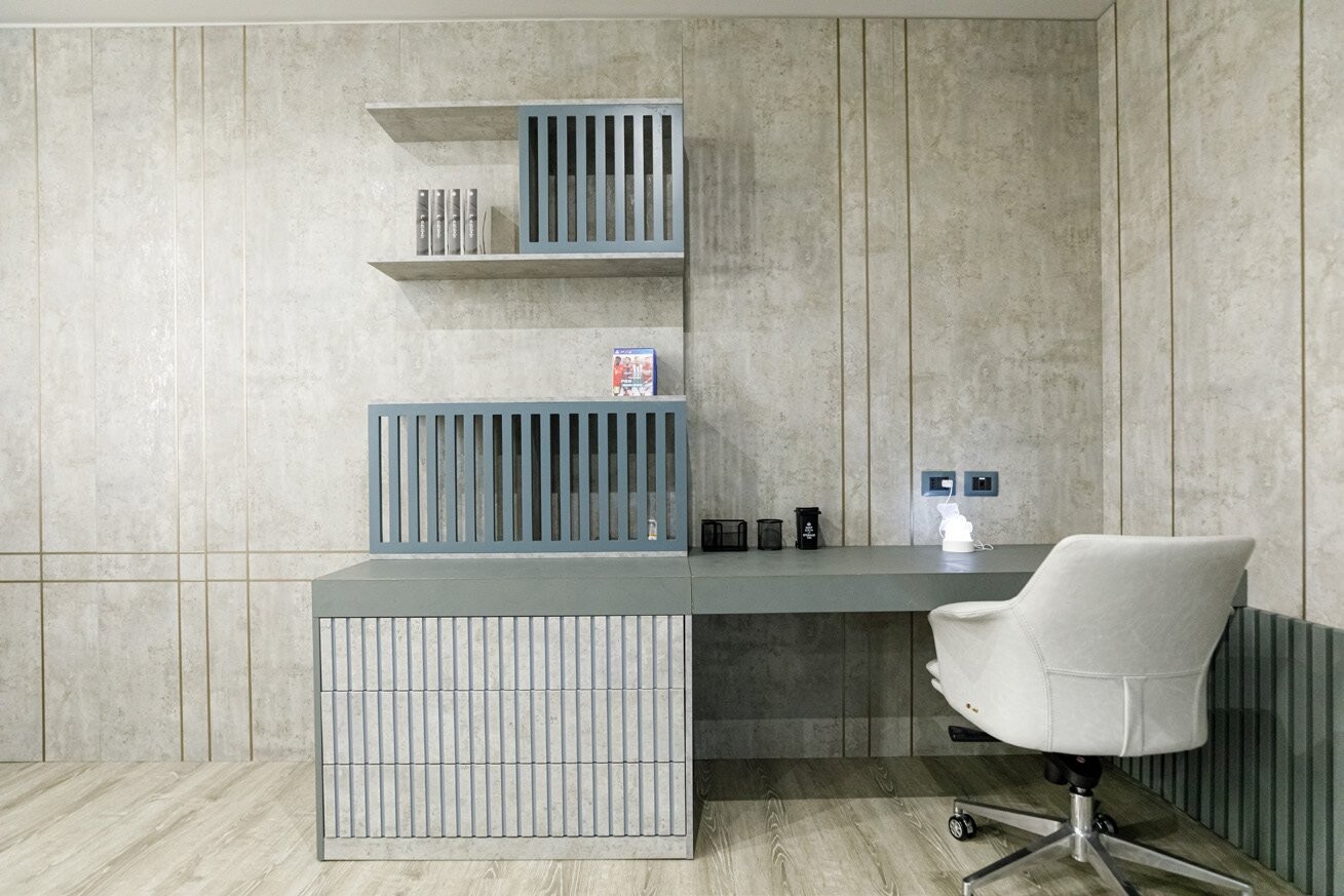 Private Villa South Albania - built-in desk with a white chair below wall shelving, Vlore