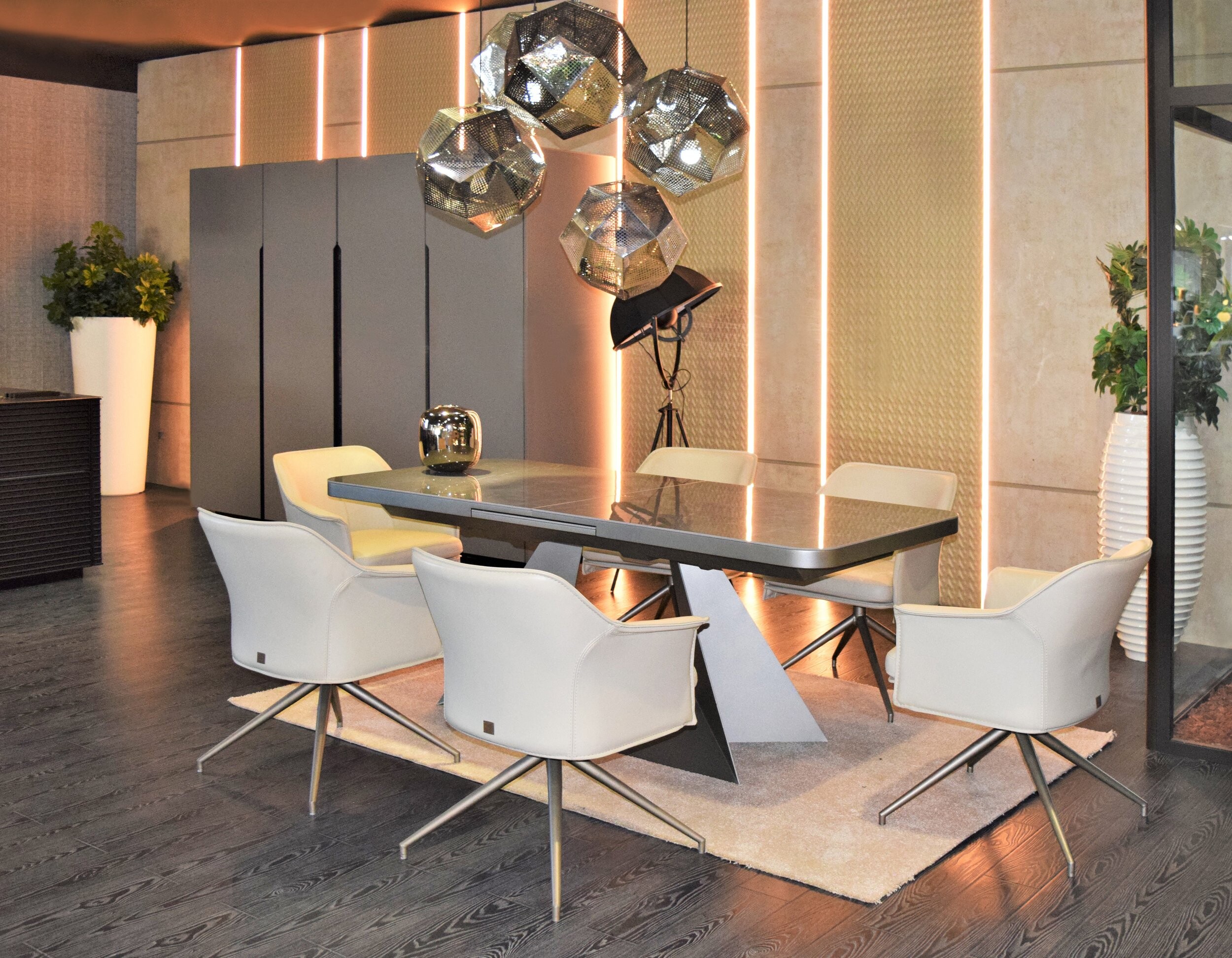 Sting contemporary extendable dining room table indoor hospitality setting