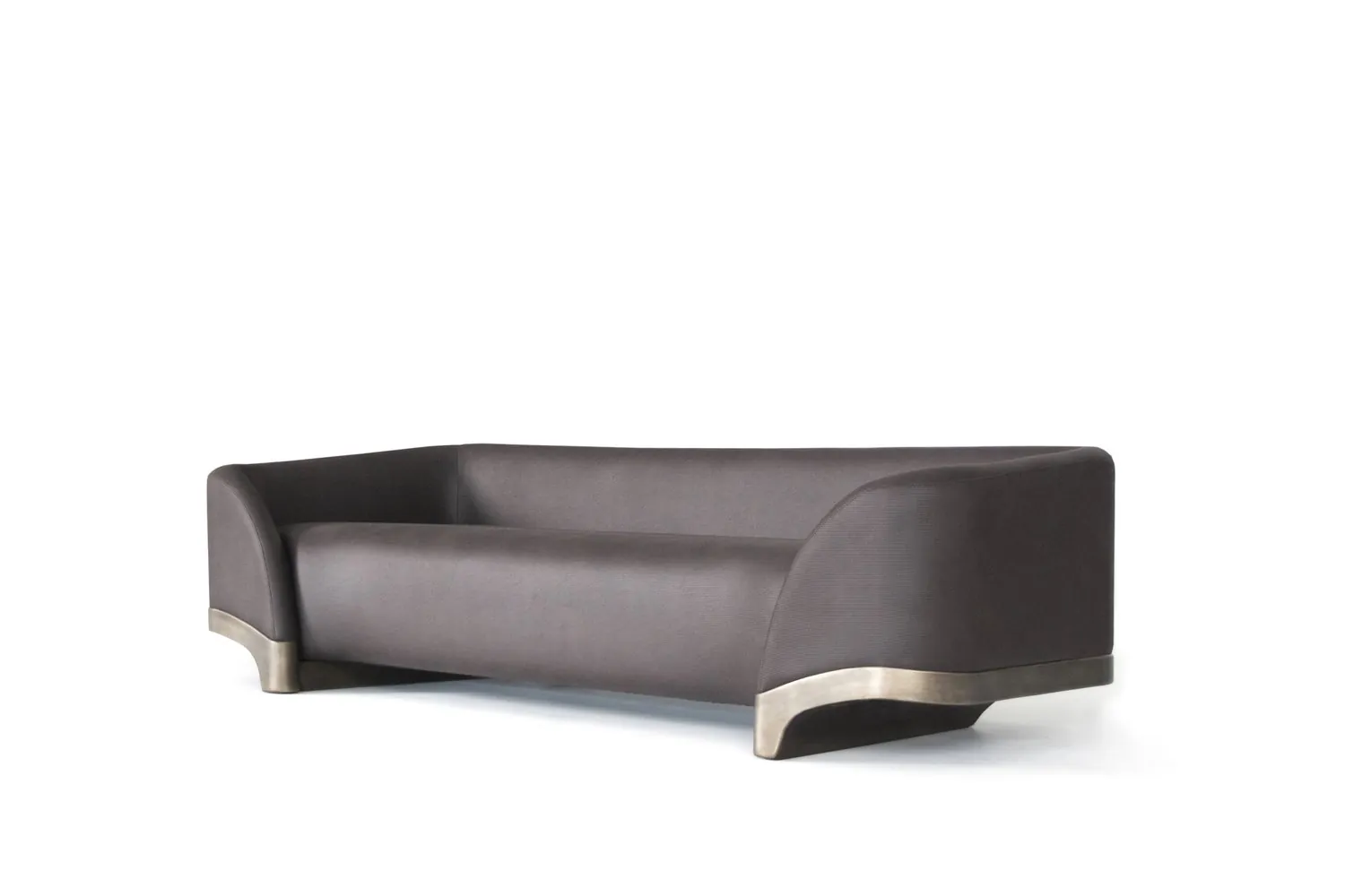 3/4 angle view of Clement curved sofa in charcoal upholstery