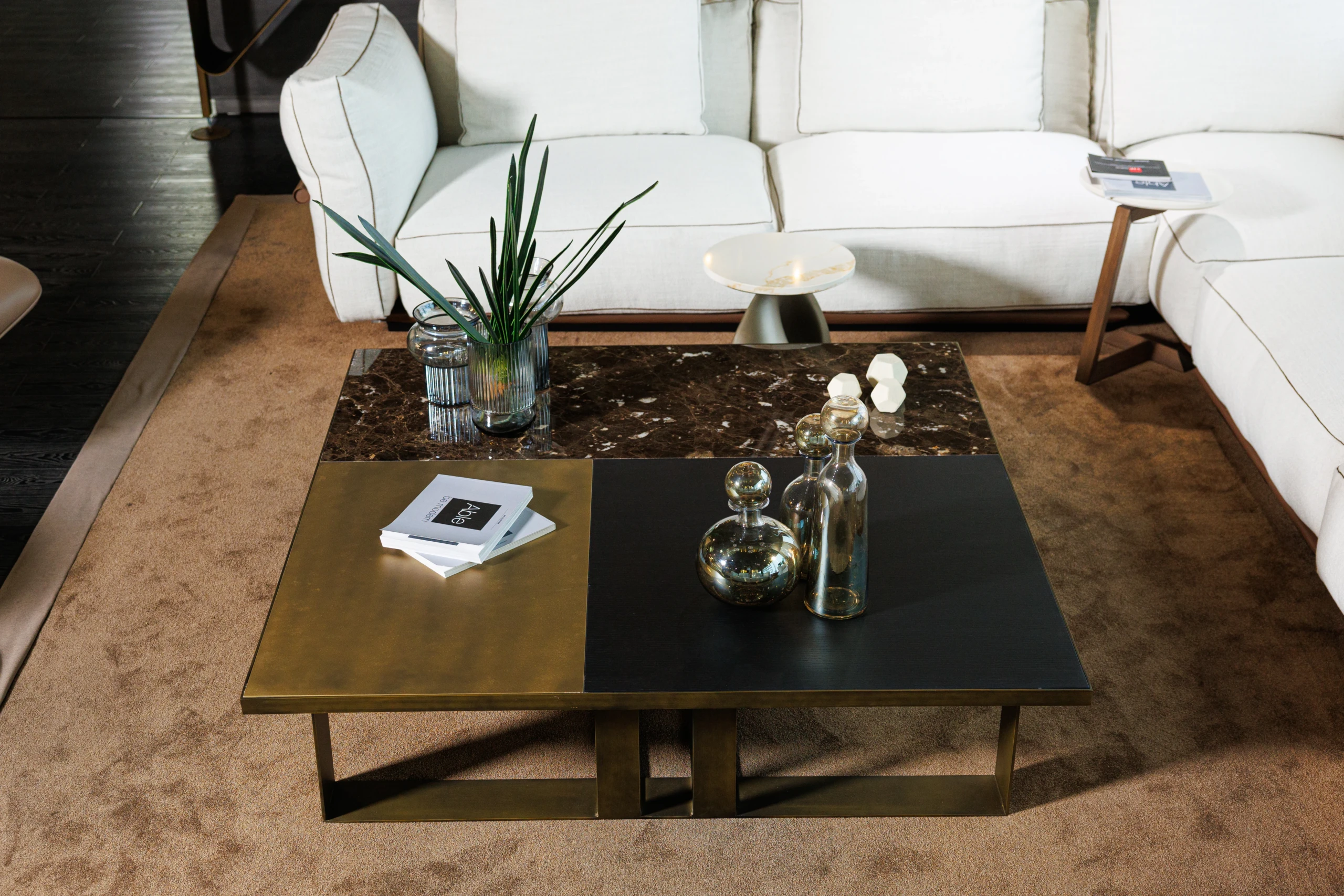 Grand coffee table in a designer lounge setting