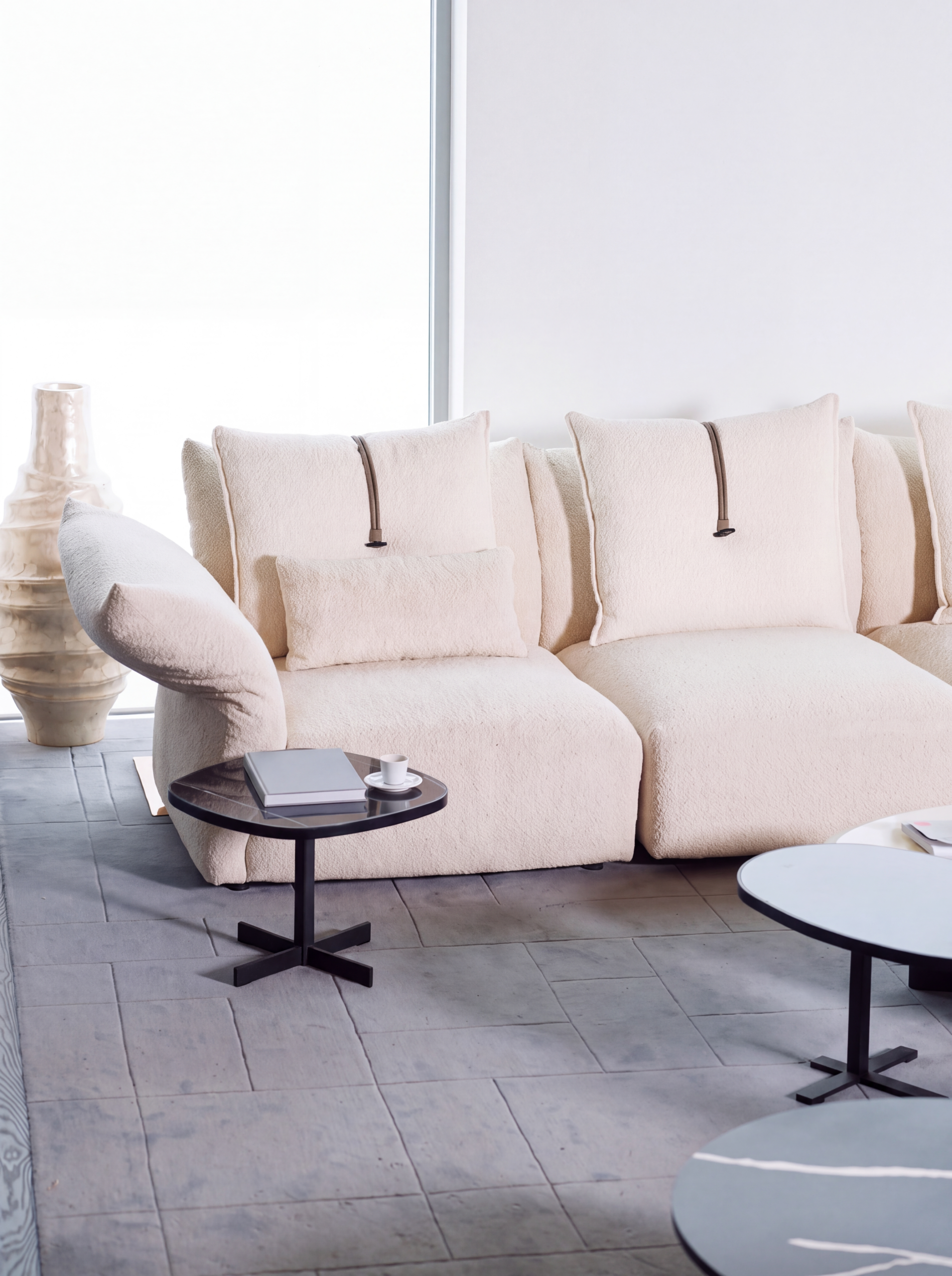 Mon coffee table in a modern living room setting