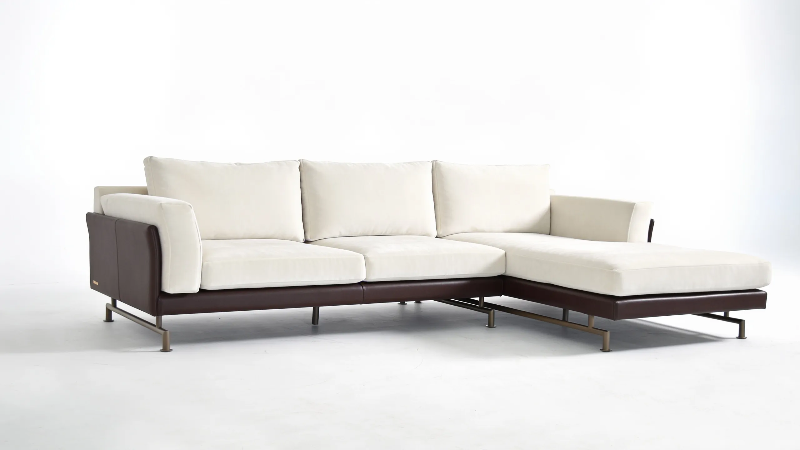 Front angle view of Roma sectional sofa in white and brown upholstery