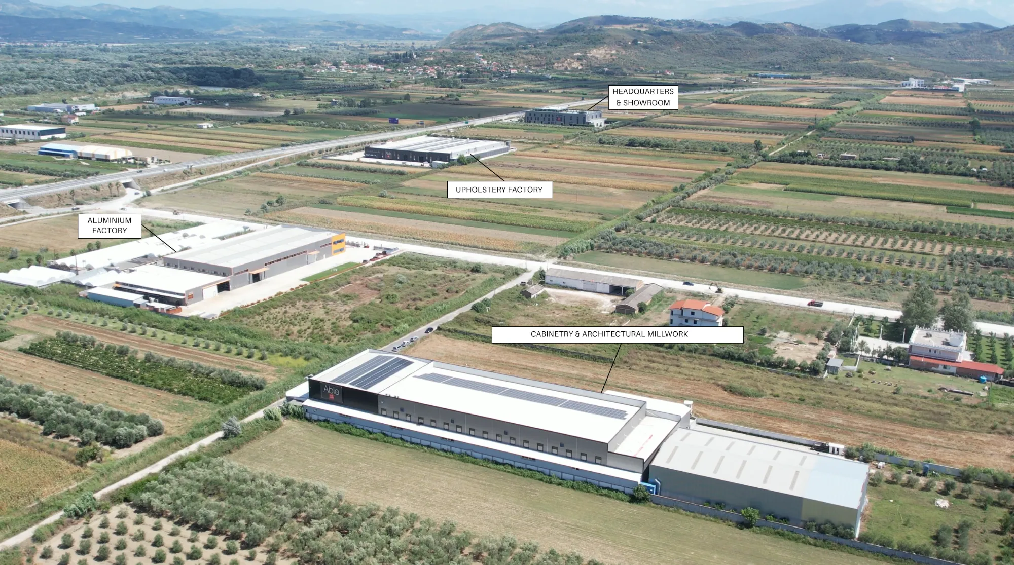 Aerial view of the Able campus in Vlore: headquarters and showroom, upholstery factory, aluminium factory, and cabinetry and architectural millwork
